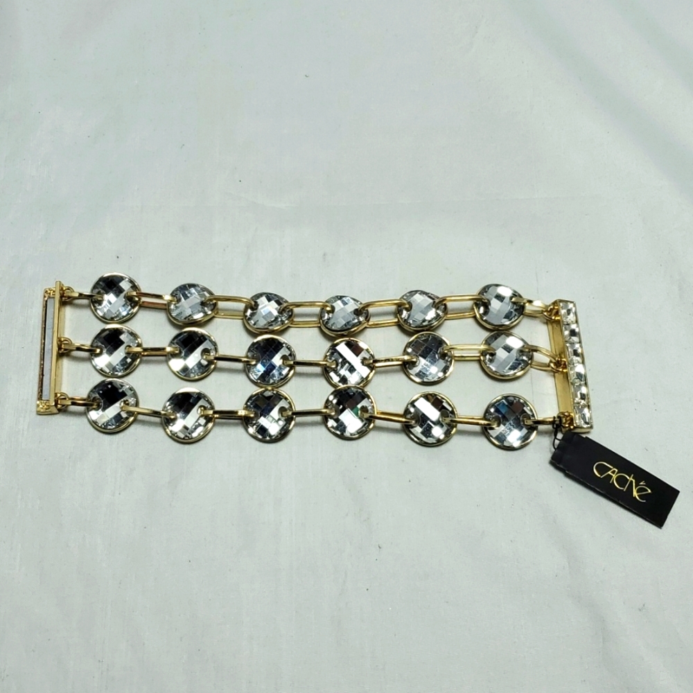 Cache 3 strand gold tone bracelet with large links & faceted crystals